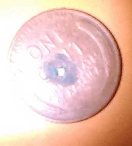 I-Have-Two-Wheat-Pennies-With-Square-Holes-Punched-In-Them.